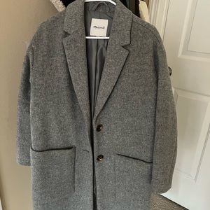 Oversized winter coat that can layer over sweaters.